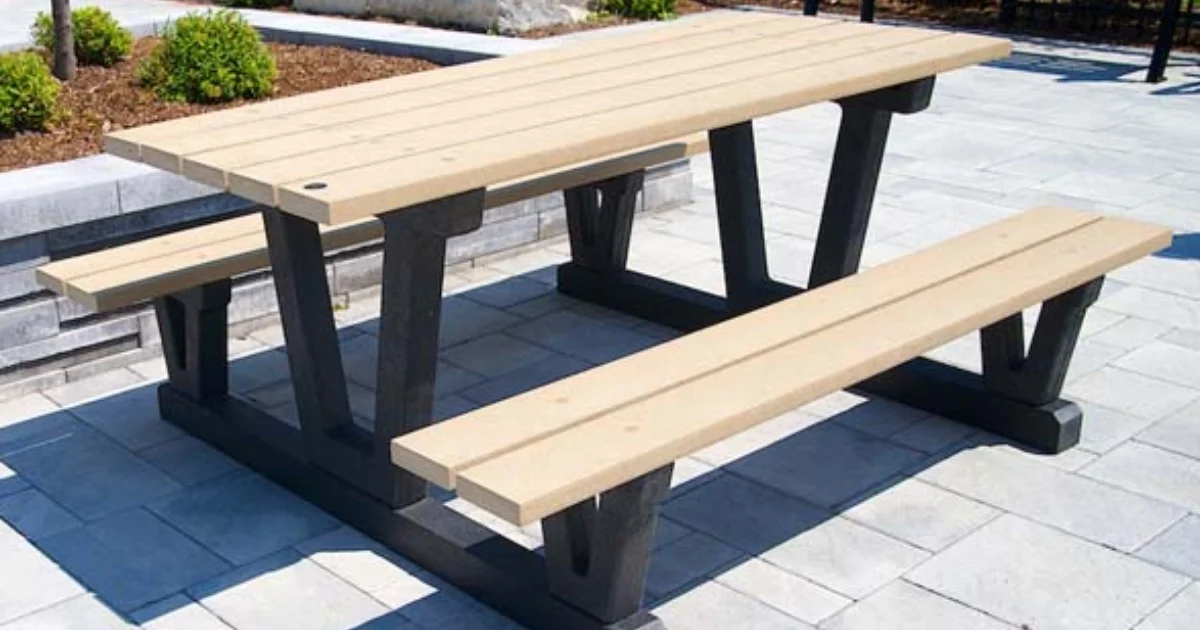 Modern beige and black picnic table on a patio